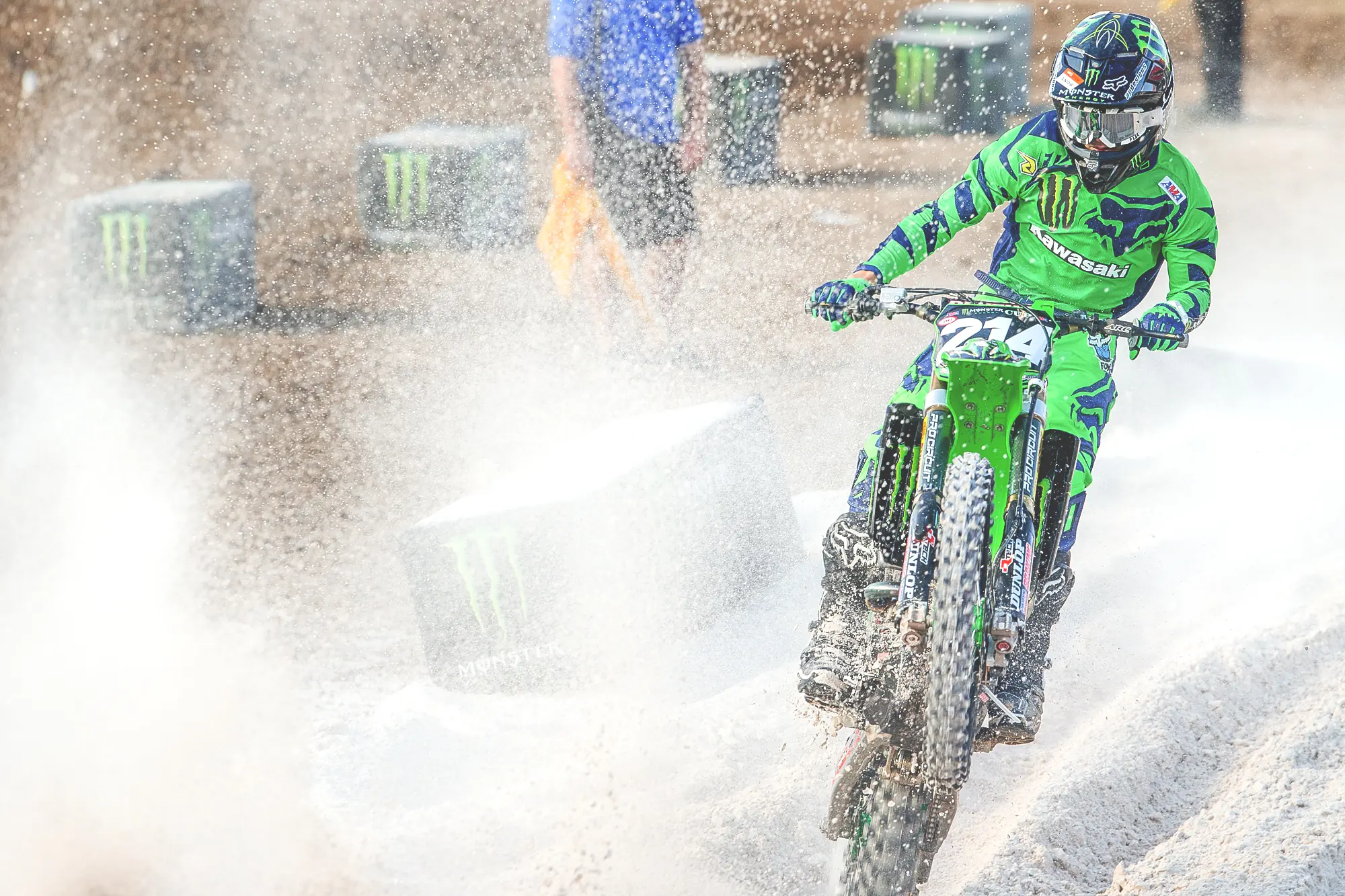 Professional Kawasaki arenacross racer photographed under stadium lights
