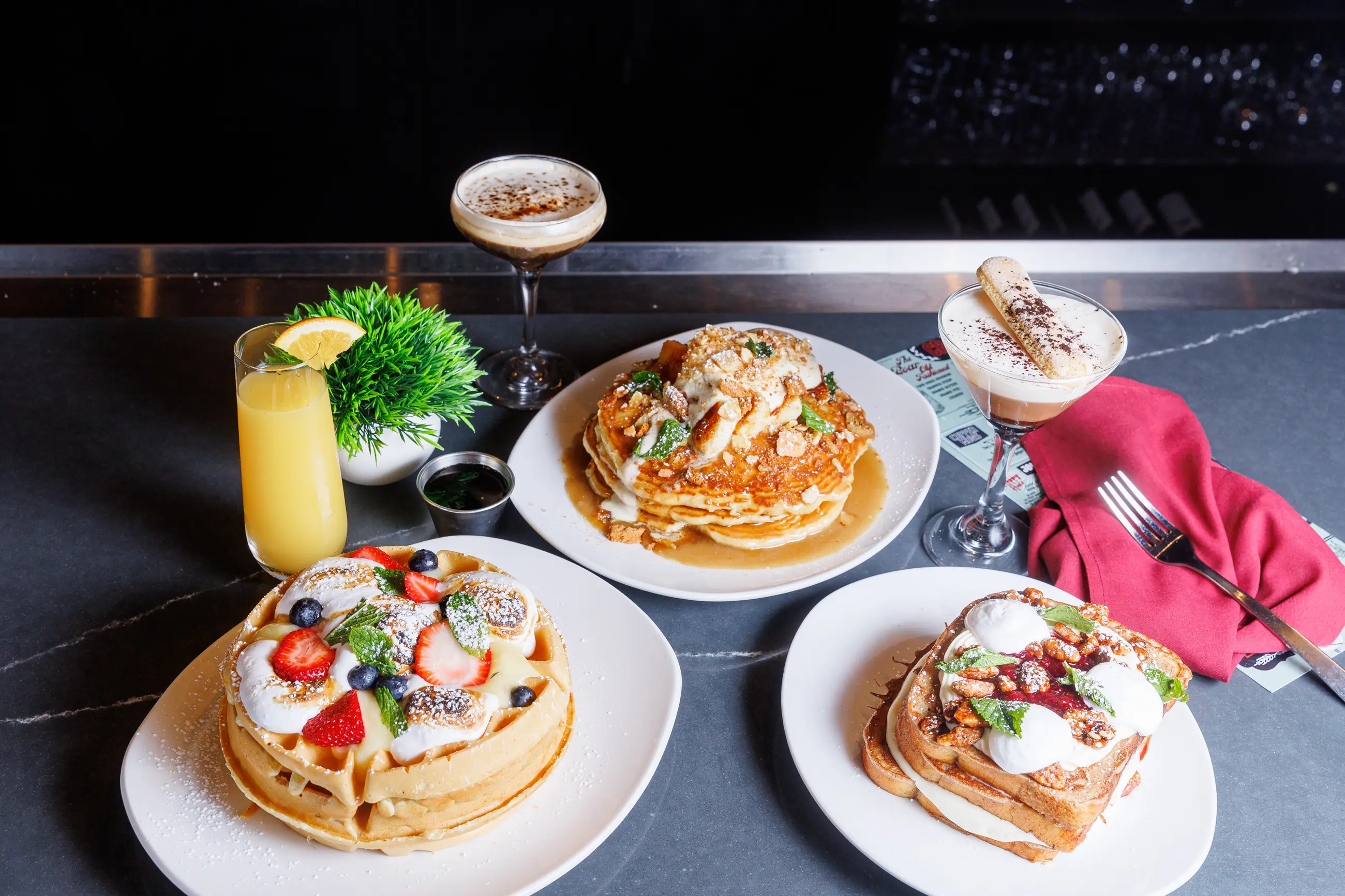Restaurant menu photography with a coordinated spread of dishes