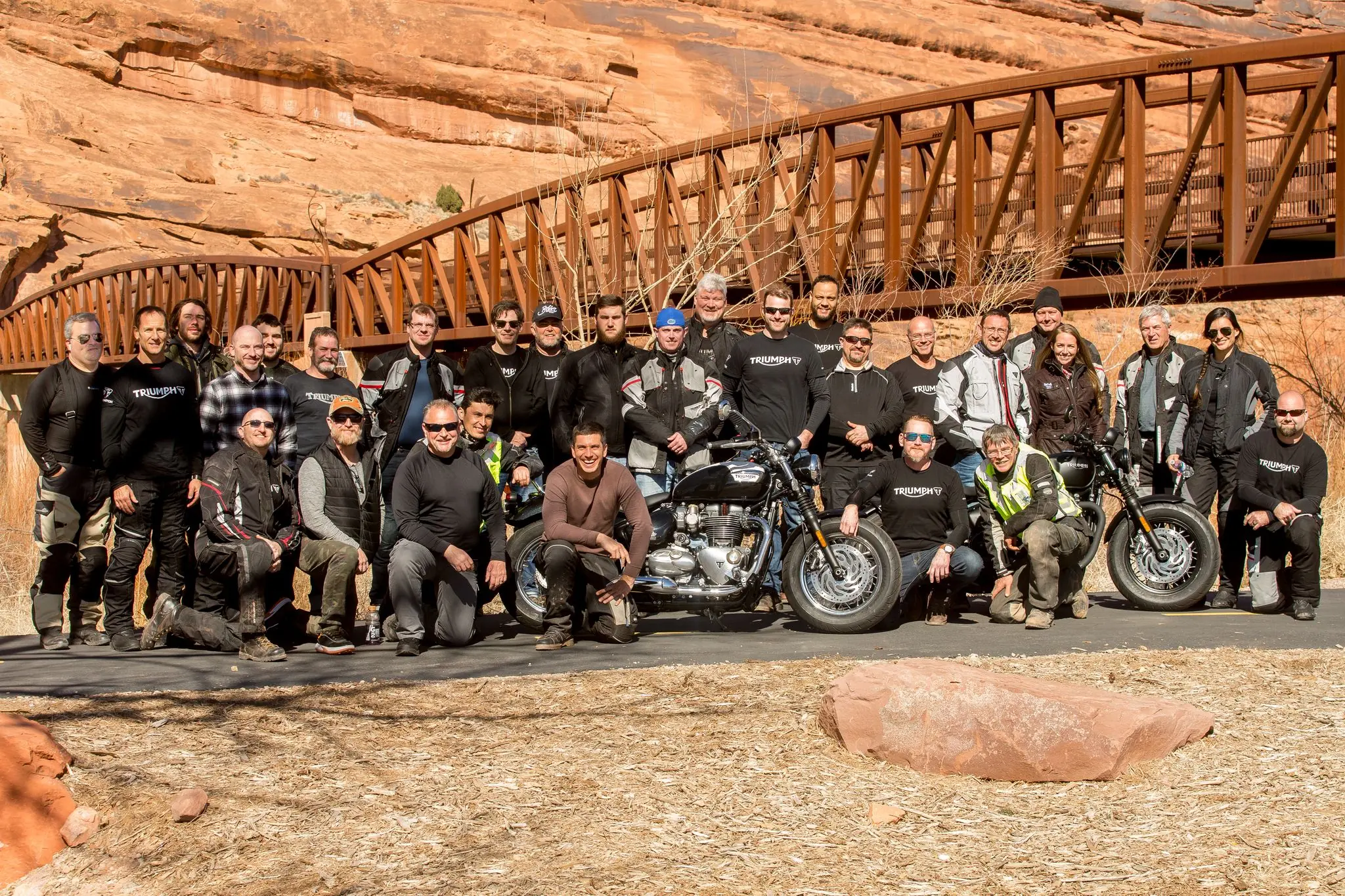 Triumph motorcycles and riders during a location production in Moab